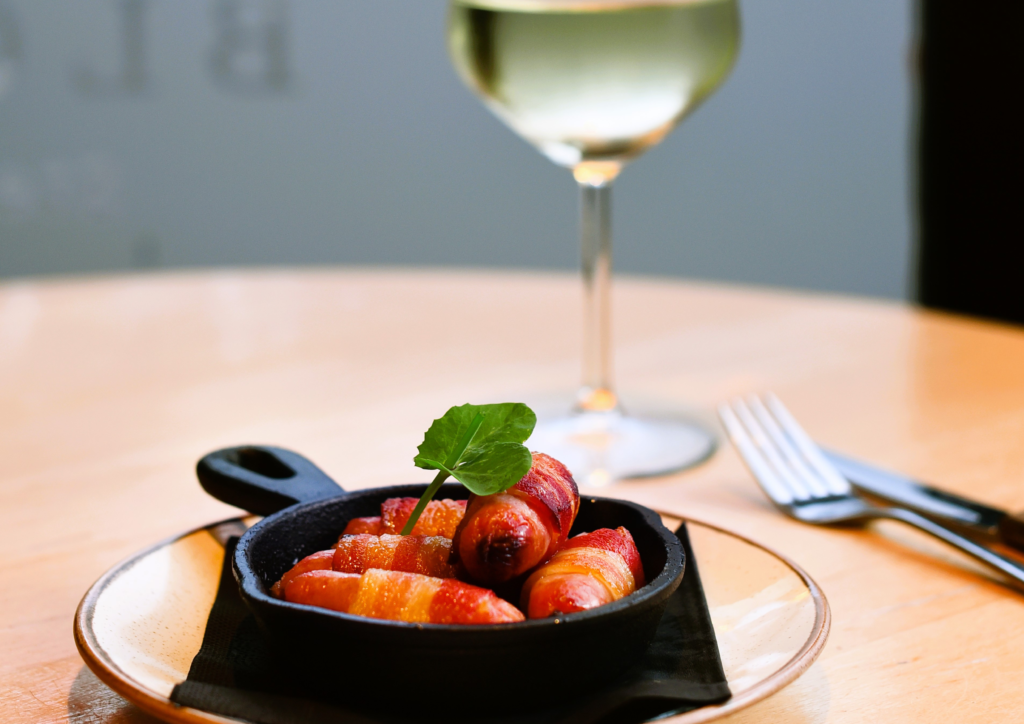 Pigs in blankets and white wine